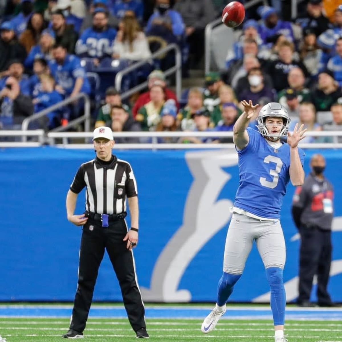 Detroit Lions punter Jack Fox (3) punts against the Washington