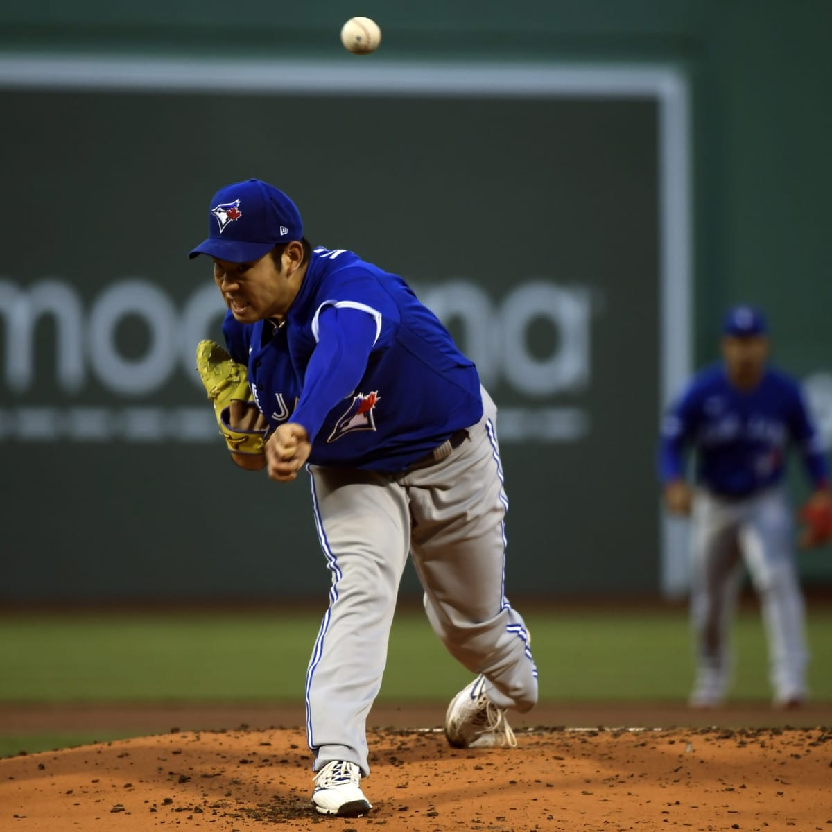 Yusei Kikuchi of the Toronto Blue Jays smiles at the end of the