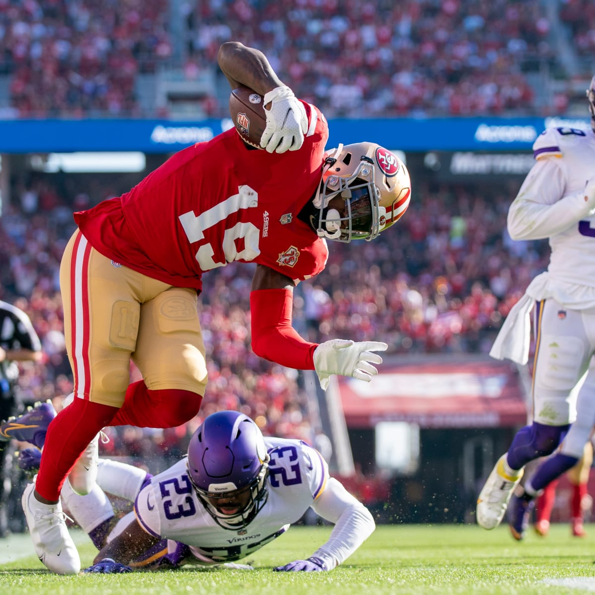 A Salute to Service ribbon is seen on the back of the helmet of Minnesota  Vikings tight end Irv Smith Jr. during the first half of an NFL football  game against the