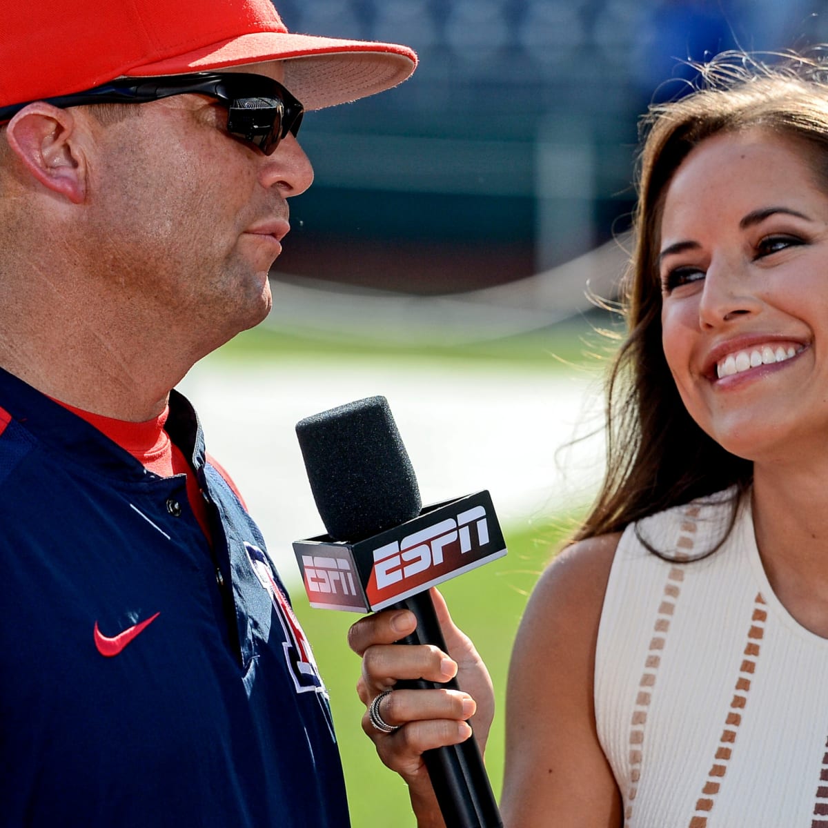 Kaylee Hartung, sideline reporter for Thursday Night Football, on the field  before an NFL football game between the Washington Commanders and the  Chicago Bears in Chicago, Thursday, Oct. 13, 2022. (AP Photo/Charles