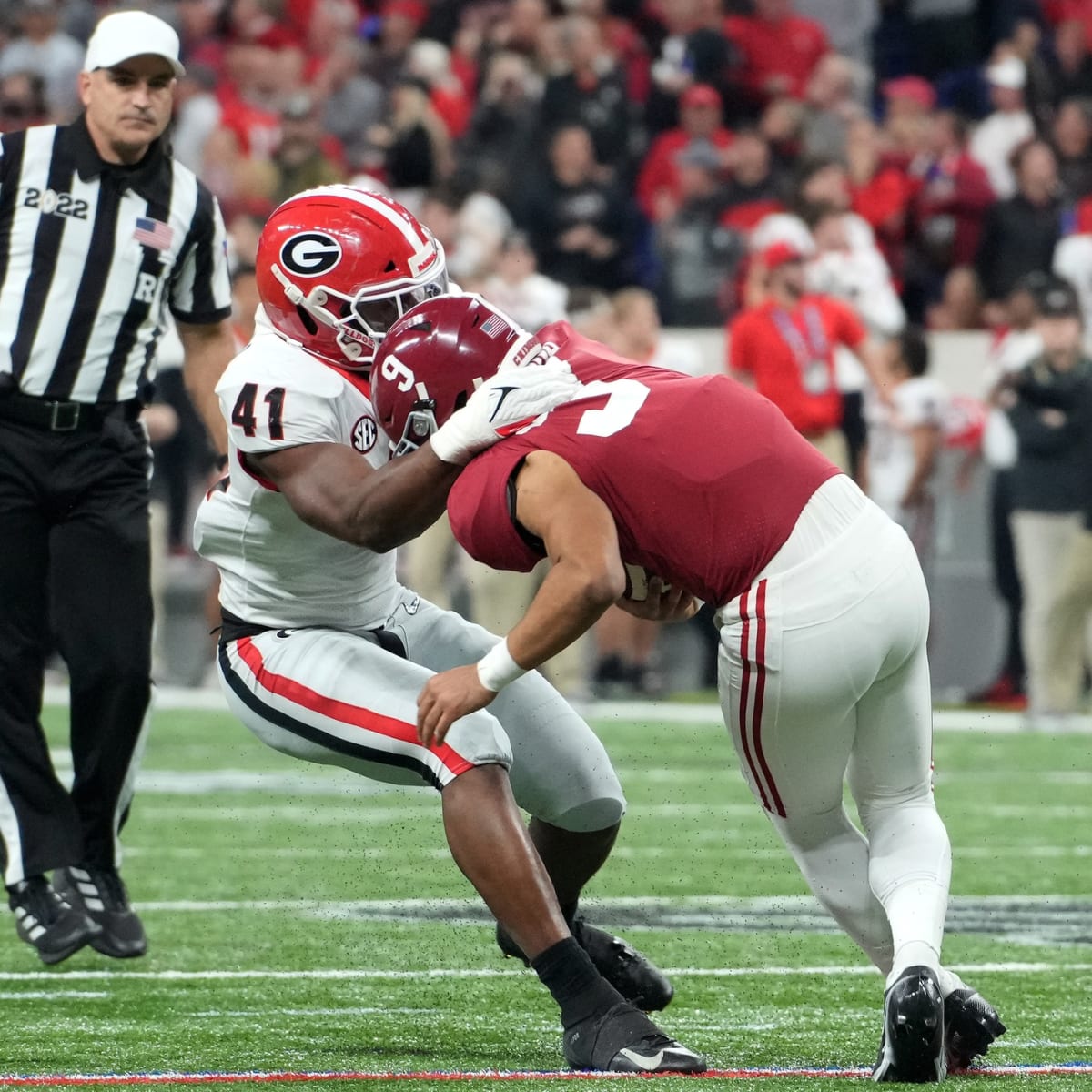 Miami Dolphins rookie linebacker Channing Tindall flies around