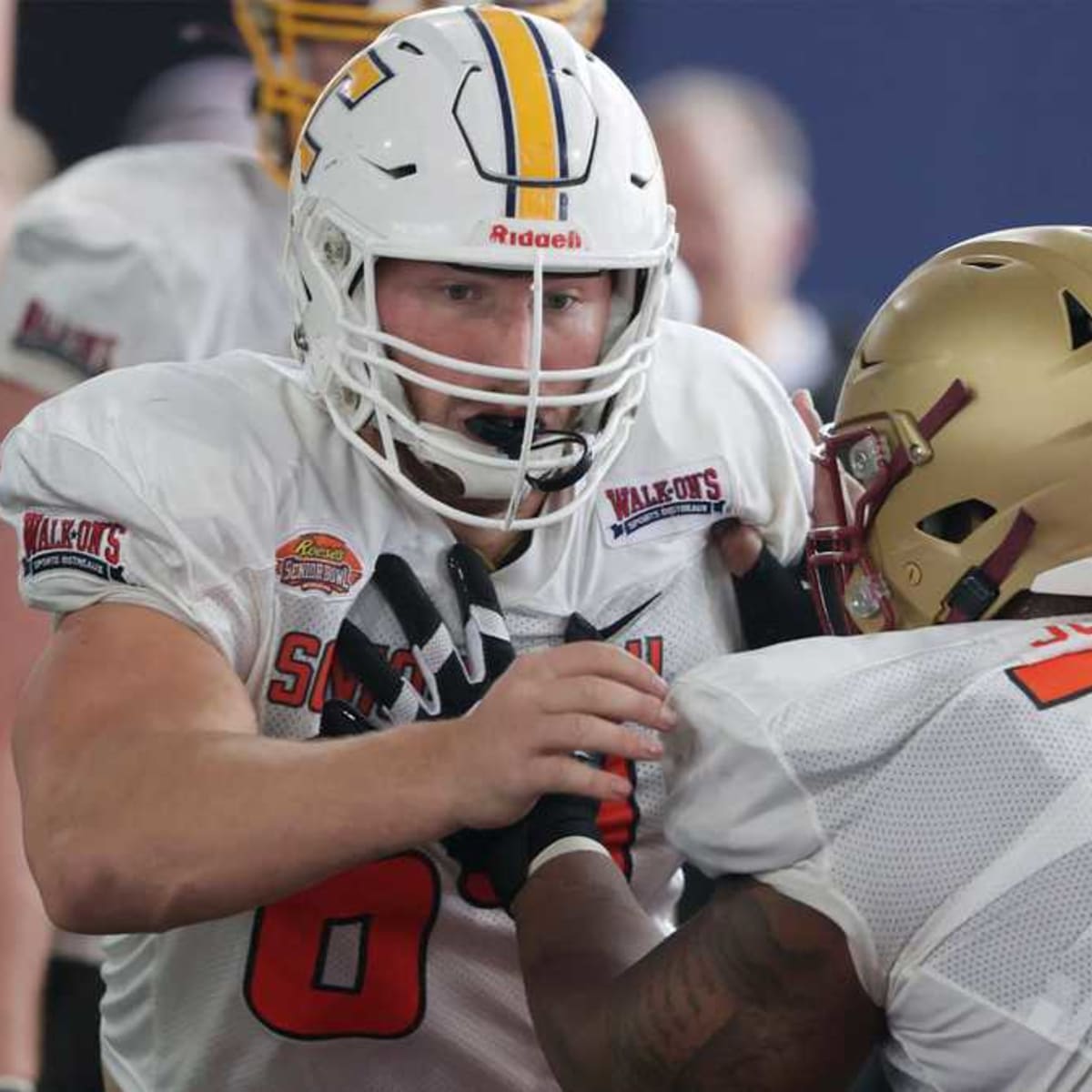 Patriots' first-round draftee Cole Strange helps create room for