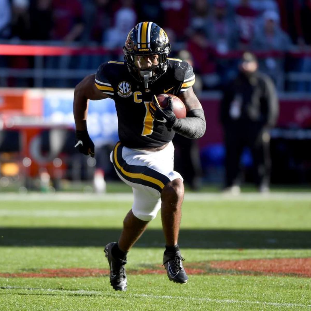 Running back (30) Tyler Badie of the Baltimore Ravens catches a