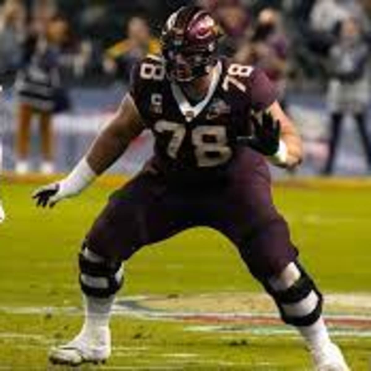 Baltimore Ravens offensive tackle Daniel Faalele takes the field