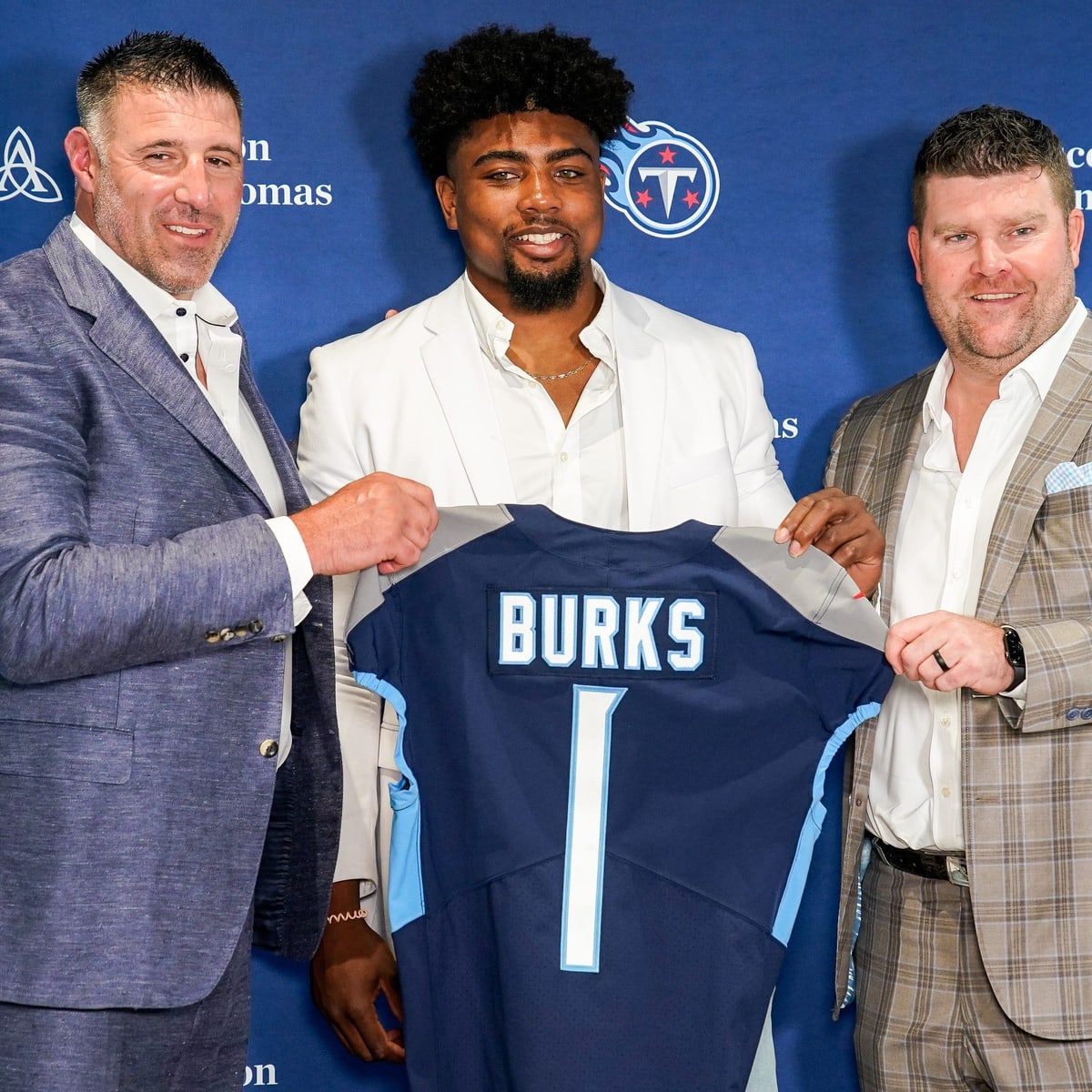 Titans agree to terms with three draft picks