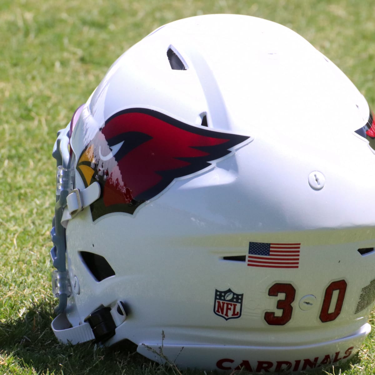 An Arizona Cardinals helmet on the grass during Arizona Cardinals