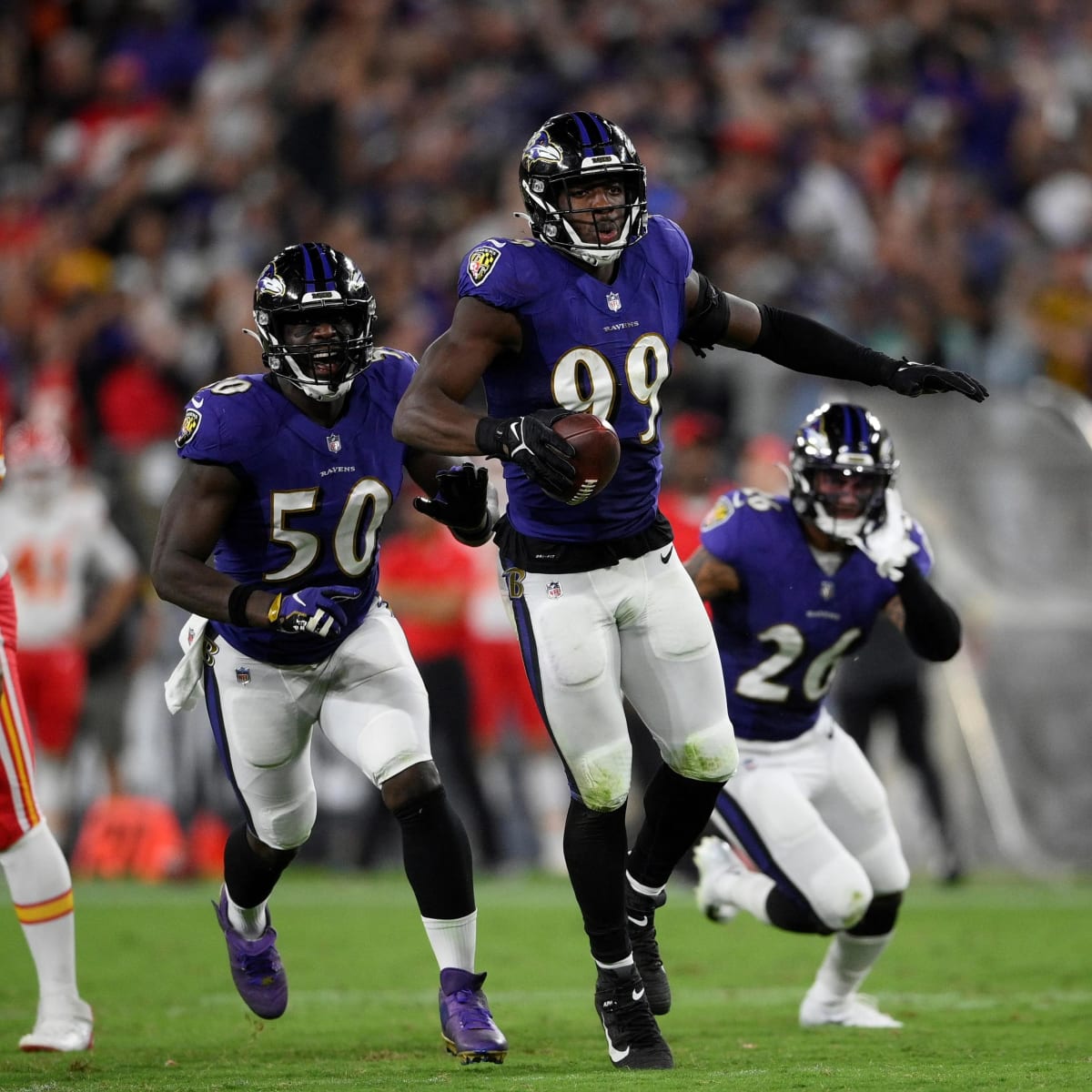 Baltimore Ravens linebacker Odafe Oweh (99) walks off the field