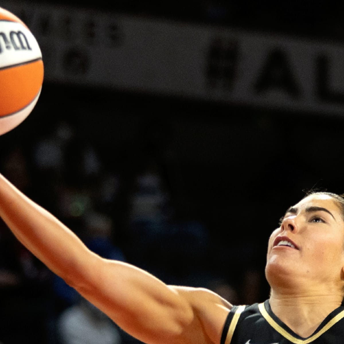 Tom Brady sat courtside at the Las Vegas Aces game and Kelsey Plum barked  at him before putting on a show