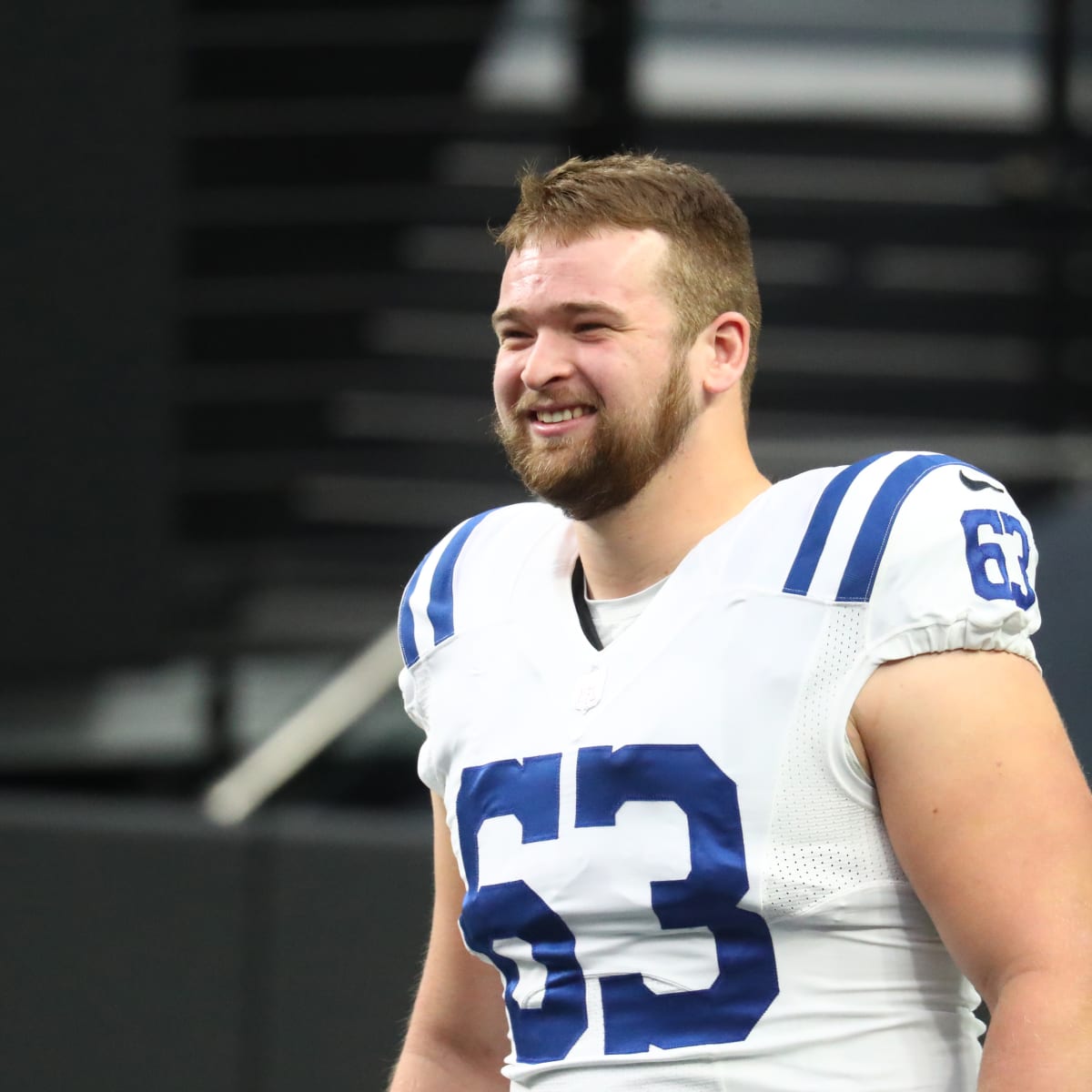 Indianapolis Colts guard Danny Pinter (63) points to the defense before the  snap during an NFL football game against the New England Patriots,  Saturday, Dec. 18, 2021, in Indianapolis. (AP Photo/Zach Bolinger