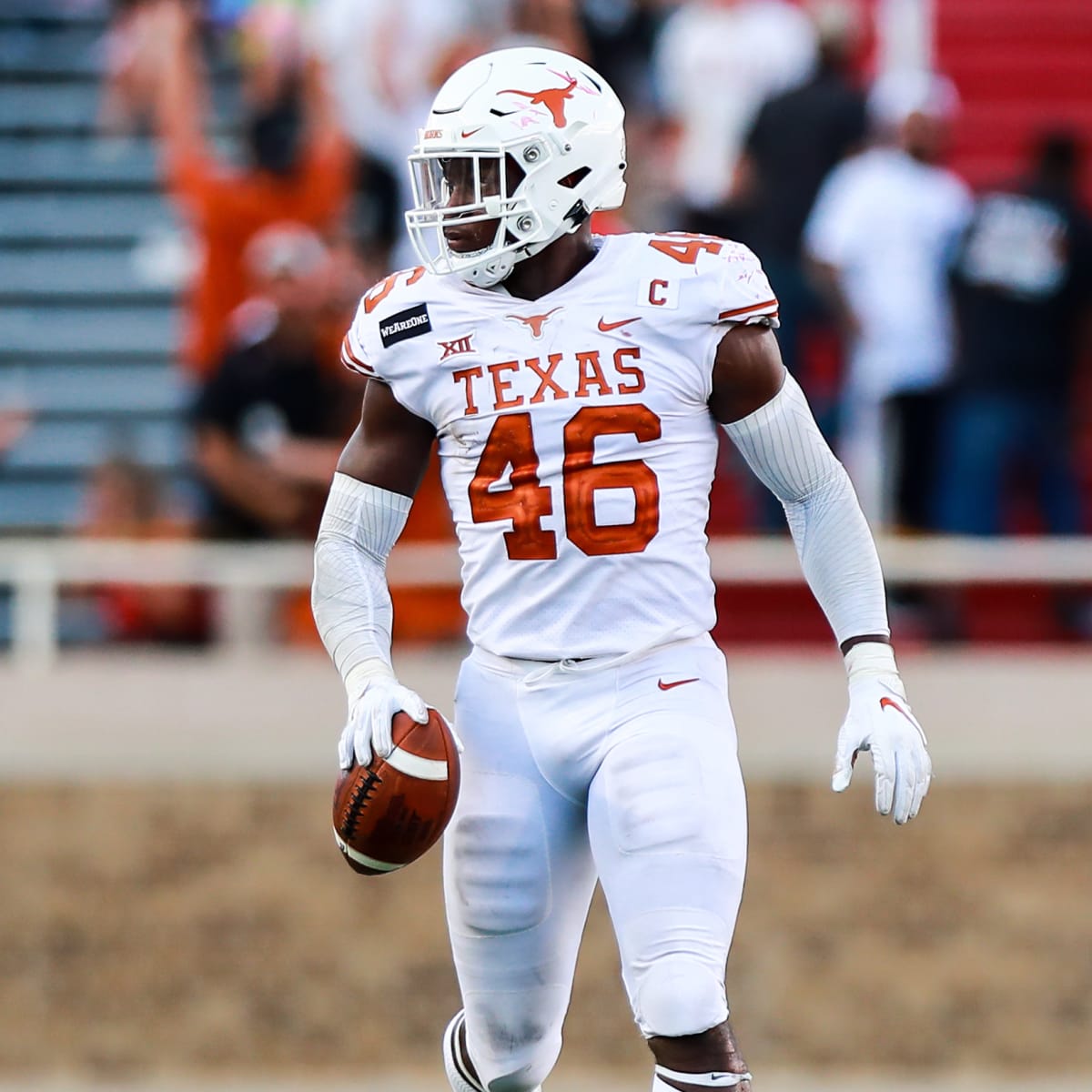 WATCH: Texas OT Samuel Cosmi's emotional draft call from Washington