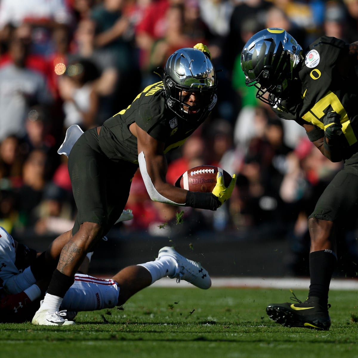 Watch: Former Oregon Ducks' star Jevon Holland forces two fumbles during  the Miami Dolphins' 70-20 rout over the Denver Broncos 