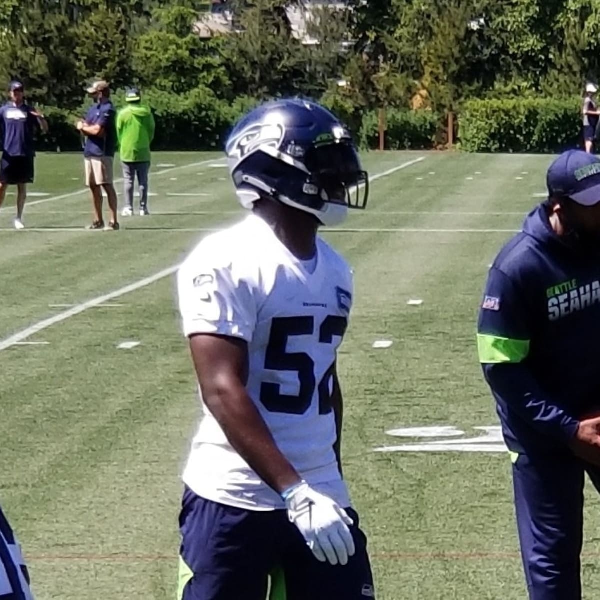 Seattle Seahawks linebacker Darrell Taylor (52) jogs off the field