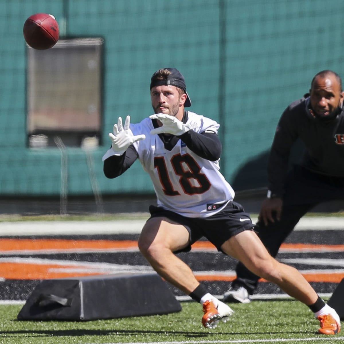 Cincinnati Bengals wide receiver Trent Taylor (11) and Cincinnati Bengals  wide receiver Ja'Marr Chase (1) celebrate a two-point conversion to tie the  game against the Kansas City Chiefs during the second half