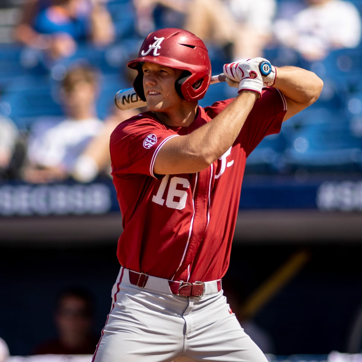 Alabama Owen Diodati (16) runs to first during an NCAA baseball