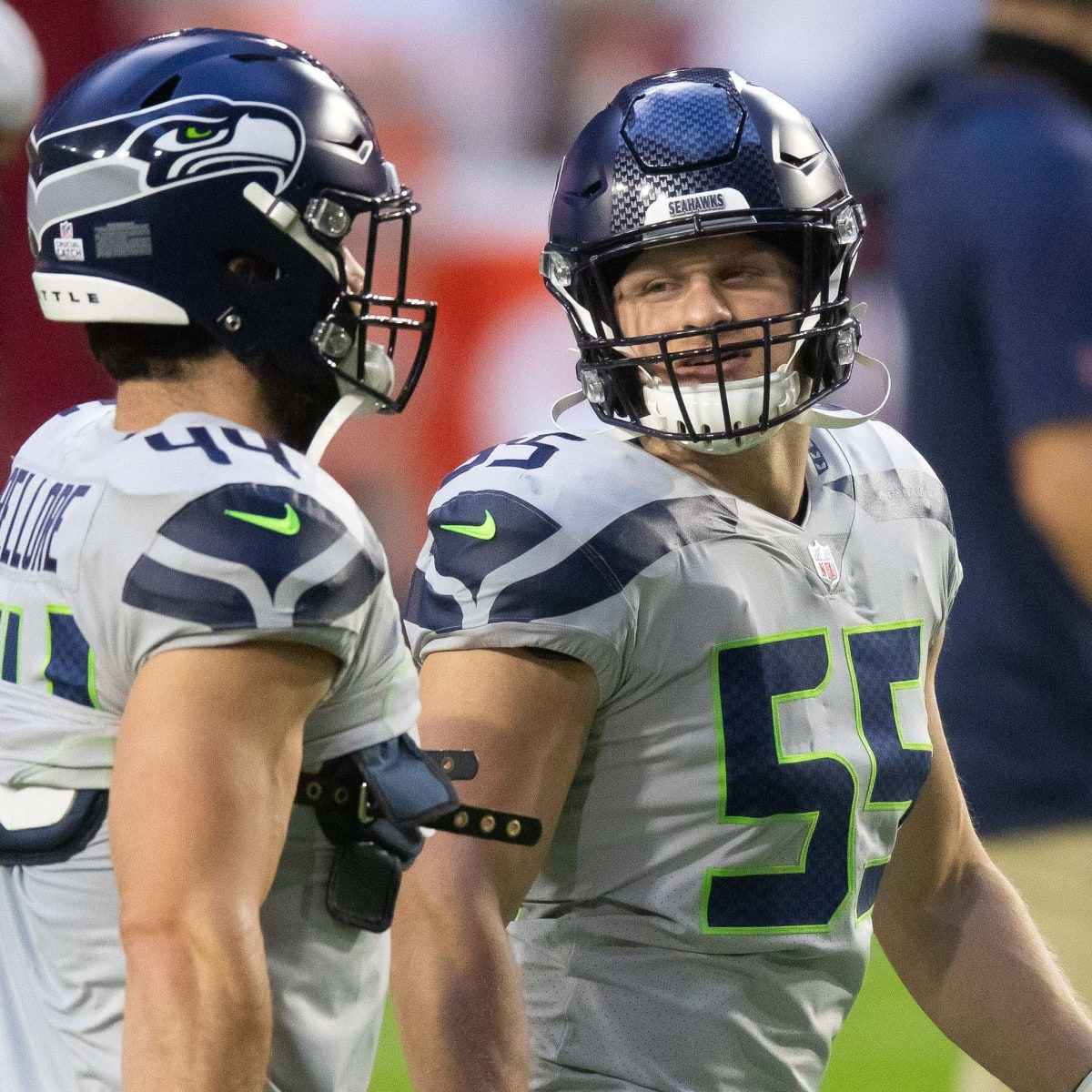 Seattle Seahawks linebacker Ben Burr-Kirven, left, and wide receiver John  Ursua hug before an NFL football game against the Los Angeles Rams Sunday,  Nov. 15, 2020, in Inglewood, Calif. (AP Photo/Ashley Landis