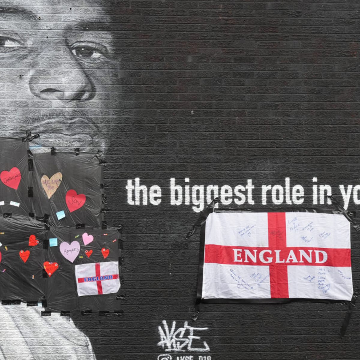 Defaced UK soccer star mural transformed into symbol of anti-racism