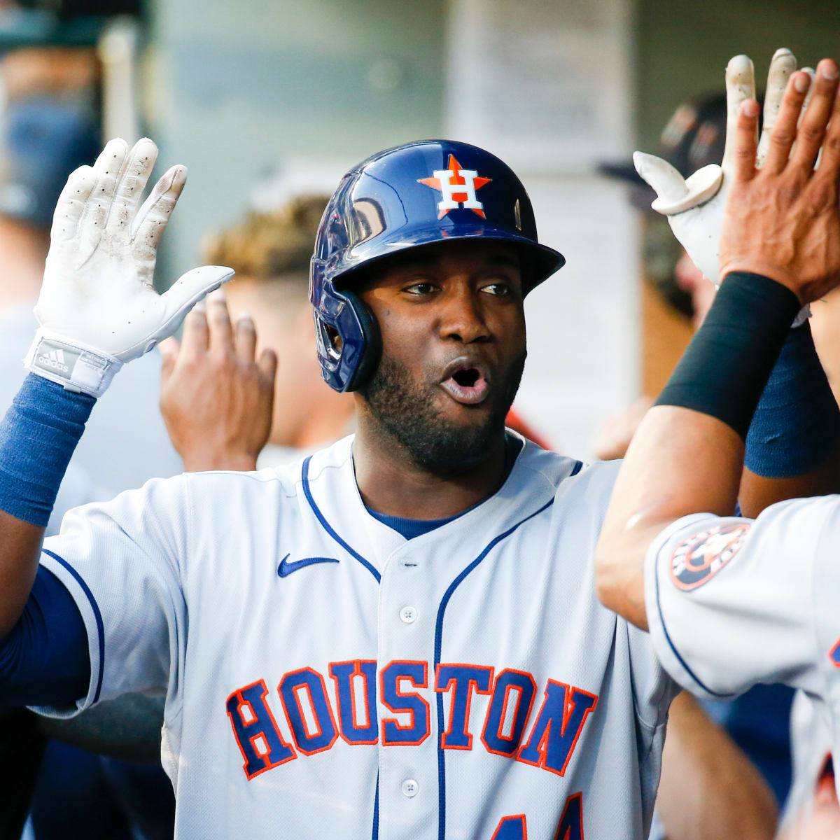 Houston Astros' Jason Castro watches the ball after hitting a two