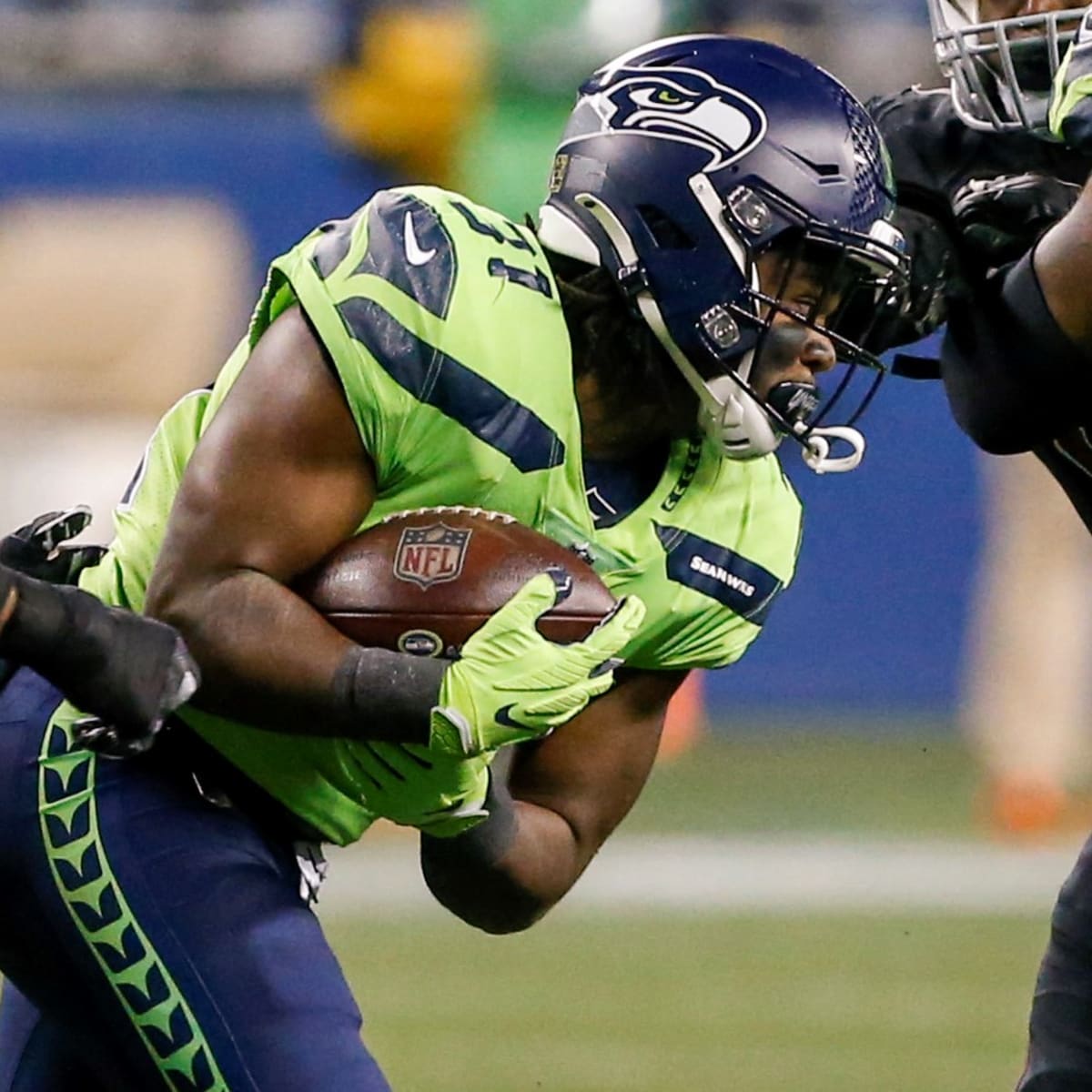 Seattle Seahawks running back DeeJay Dallas celebrates after scoring  against the Dallas Cowboys during the first half of a preseason NFL  football game Saturday, Aug. 19, 2023, in Seattle. (AP Photo/Lindsey Wasson