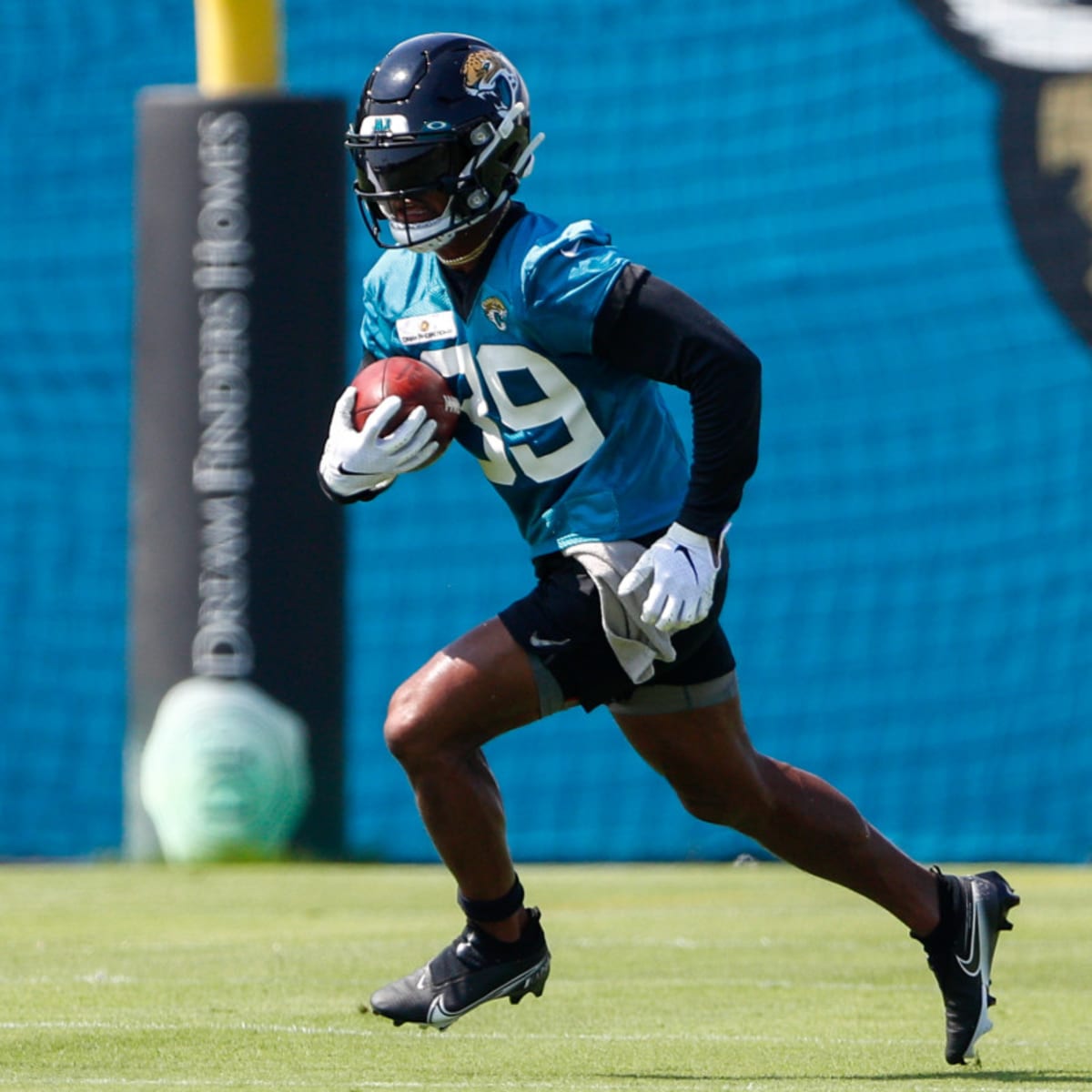 Jacksonville, Florida, USA. January 7, 2023: Jacksonville Jaguars wide  receiver JAMAL AGNEW (39) gets tackled after returning the ball during the  Jacksonville Jaguars vs Tennessee Titans NFL game at TIAA Bank Field