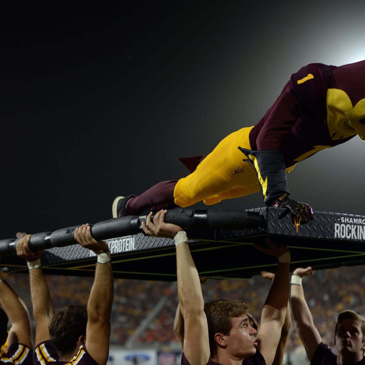 Sparky busting a move  Mascot, Sports advertising, Bust a move