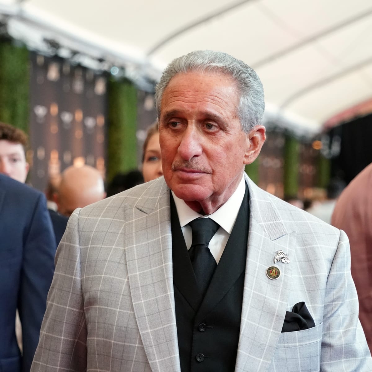 Atlanta Falcons owner Arthur Blank models a new Falcons' jersey