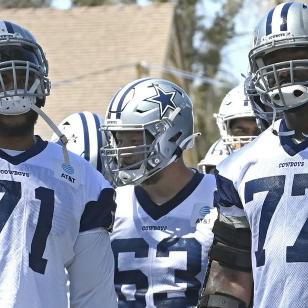 Dallas Cowboys offensive tackle Tyron Smith (77) walks up to the line of  scrimmage during an