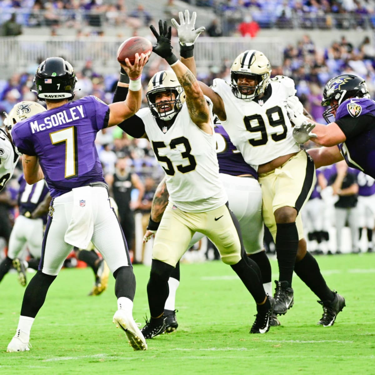 Baltimore Ravens linebacker Patrick Queen (6) greets quarterback Lamar  Jackson prior to an NFL preseason football game against the New Orleans  Saints, Saturday, Aug. 14, 2021, in Baltimore. (AP Photo/Nick Wass Stock