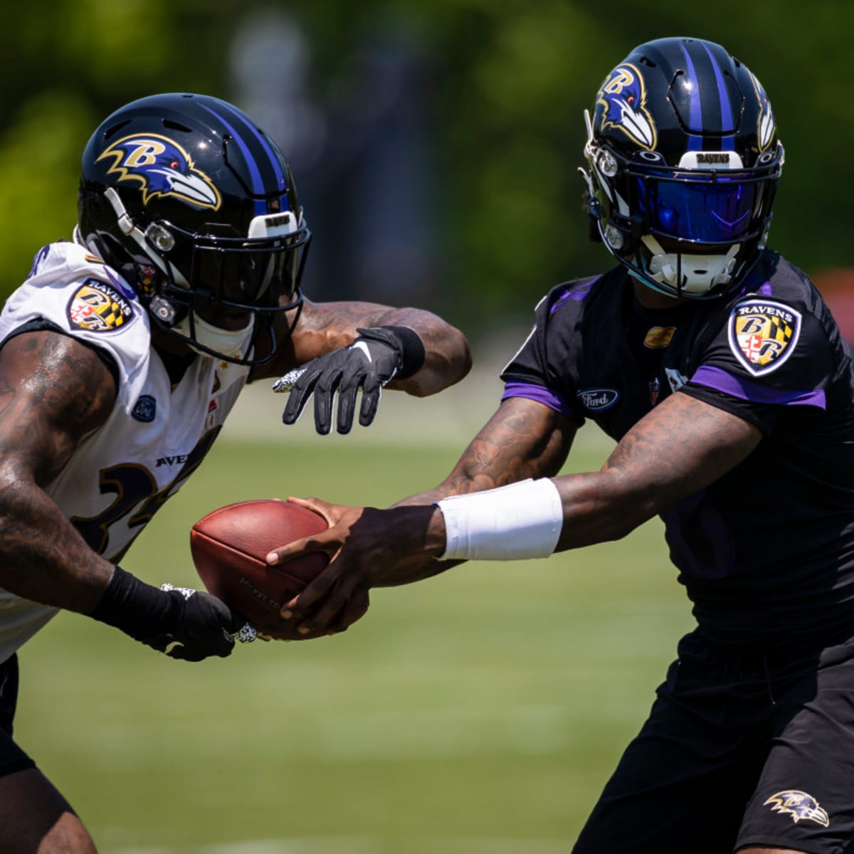 Baltimore Ravens running back Ty'Son Williams (34) pushes through the goal  line to score a two-point conversion against the New Orleans Saints during  the second half of an NFL preseason football game