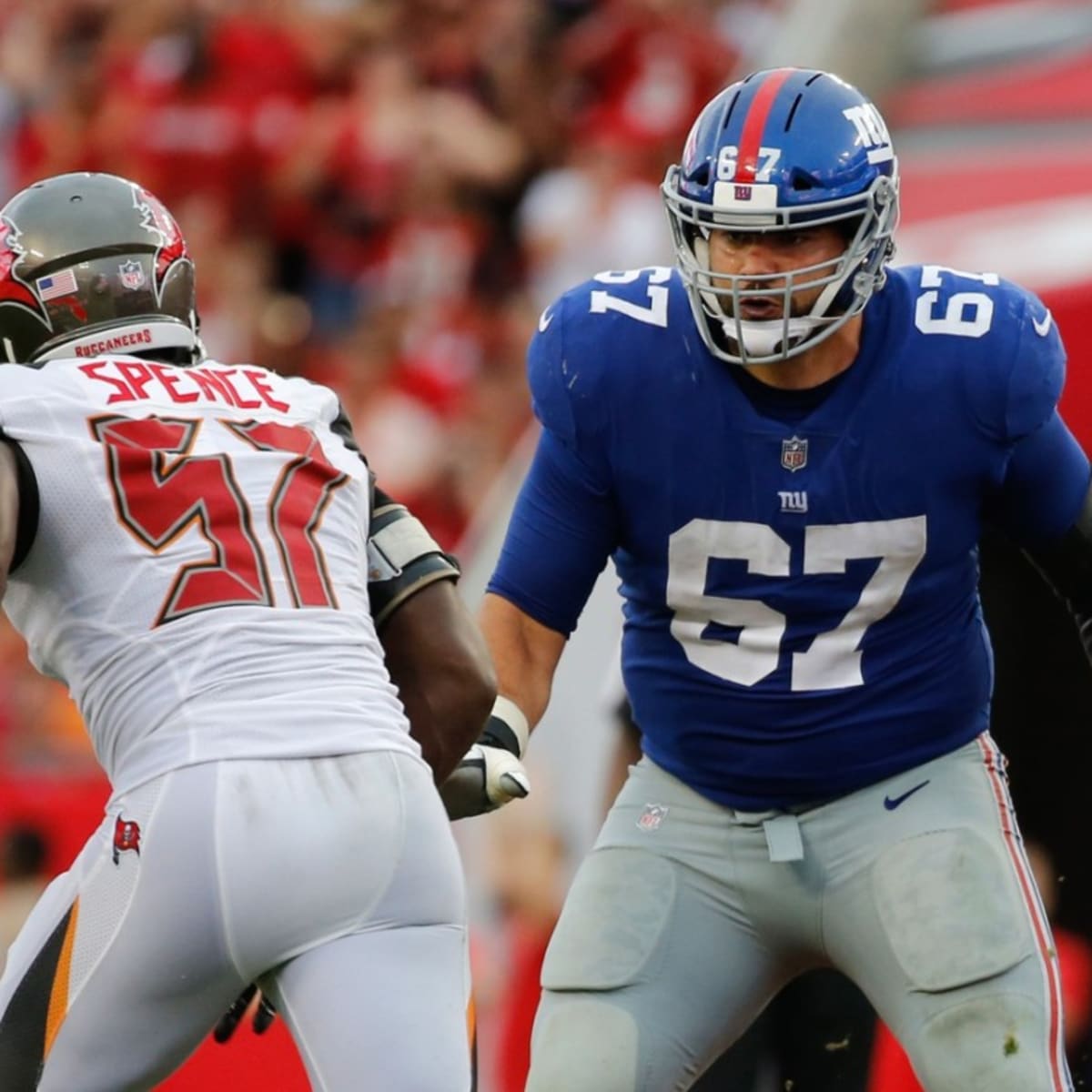 Cincinnati Bengals defensive end Joseph Ossai drops Tampa Bay Buccaneers  quarterback Tom Brady for his first preseason sack