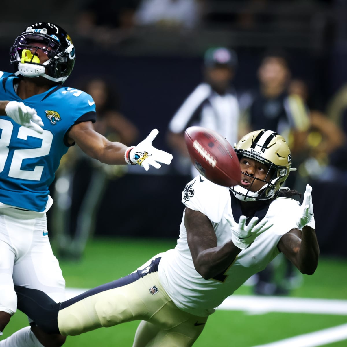 New Orleans Saints fans react to a replay call during the second half of an  NFL football game against the Jacksonville Jaguars, Sunday, Oct. 13, 2019,  in Jacksonville, Fla. (AP Photo/Stephen B.