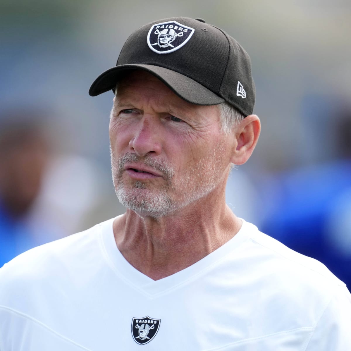 Mike Mayock, right, introduces members of his family to Oakland Raiders  owner Mark Davis, second from right, and head coach Jon Gruden, third from  left, at a news conference announcing Mayock as