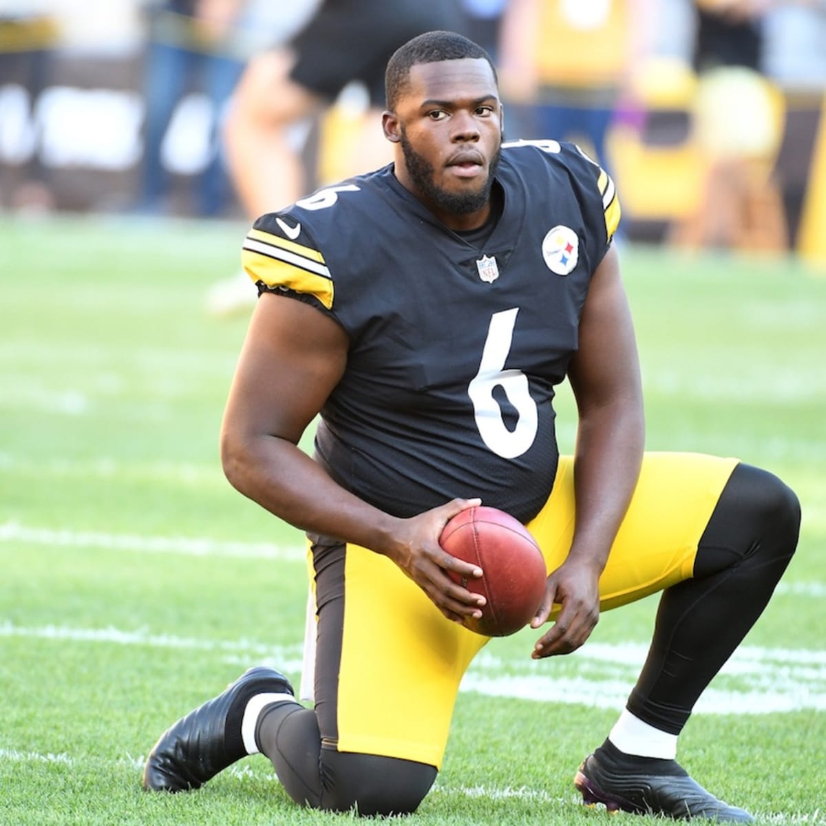 Pittsburgh Steelers punter Pressley Harvin III (6) runs for the