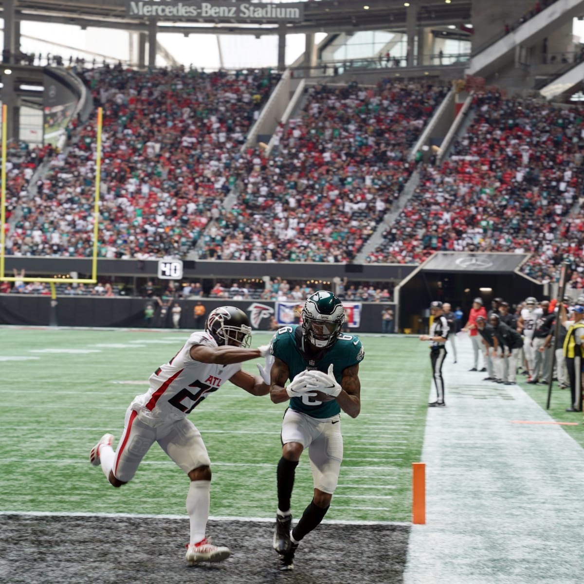 Hurts 3 TD passes, Smith scores, Eagles rout Falcons 32-6