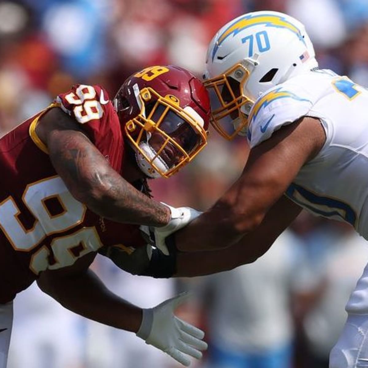 Tackle (70) Rashawn Slater of the Los Angeles Chargers blocks