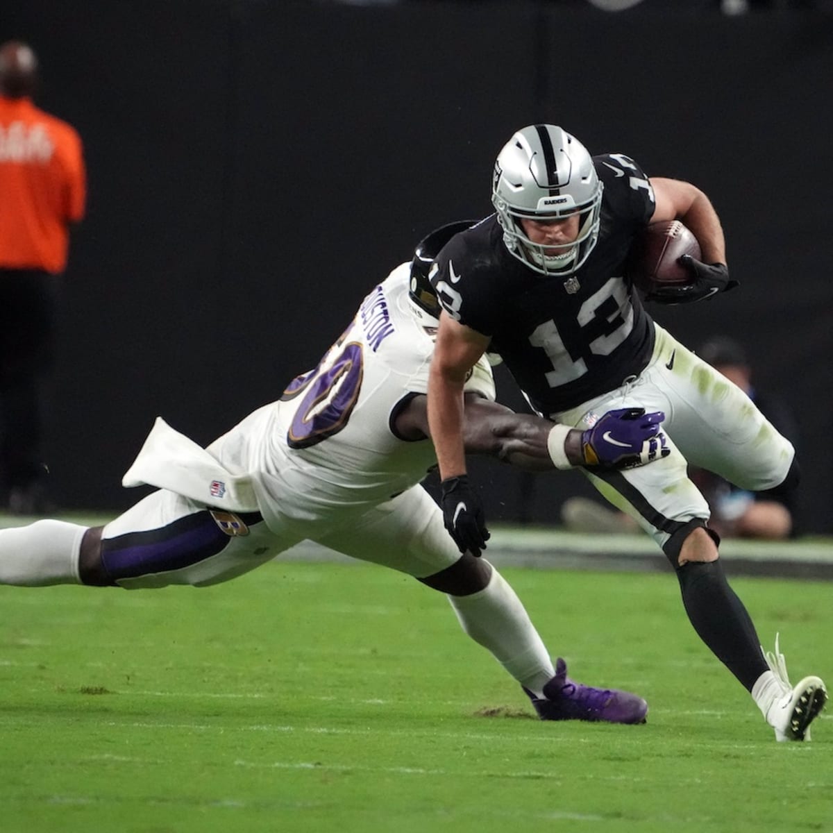 FILE - Las Vegas Raiders wide receiver Hunter Renfrow (13) runs the ball  against the Kansas City Chiefs during the first half of an NFL football game  Jan. 7, 2023, in Las