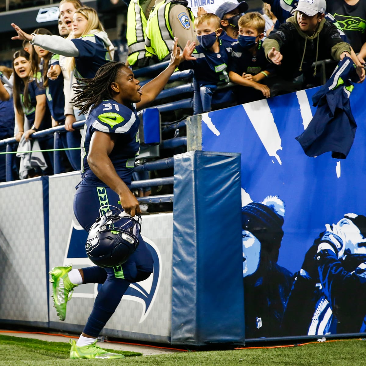 12s celebrate playoff-bound Seahawks after winning at Lumen Field