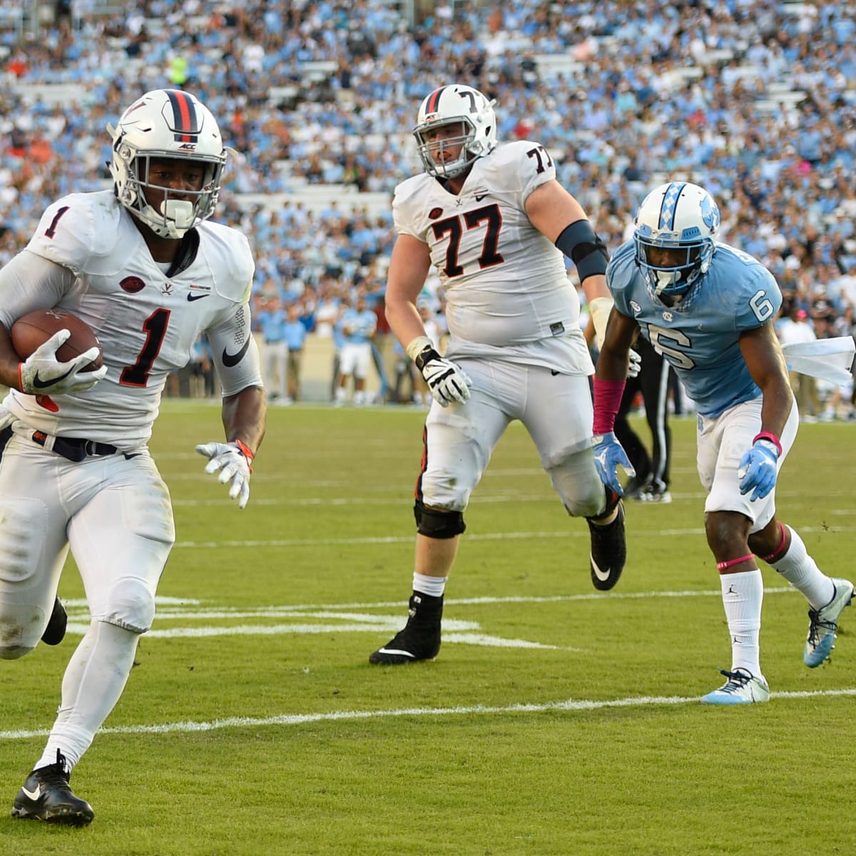 Virginia wide receiver Olamide Zaccheaus (4) runs against Duke during the  second half of an NCAA college football game in Durham, N.C., Saturday,  Oct. 20, 2018. Virginia won 28-14. (AP Photo/Gerry Broome