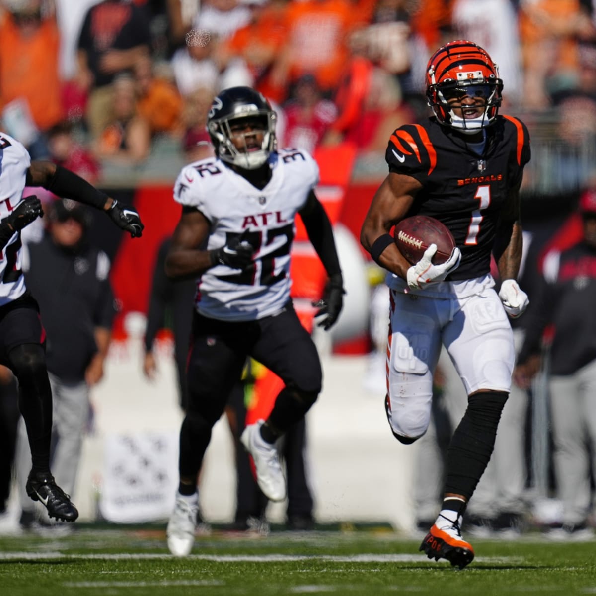 Cincinnati Bengals wide receiver Trent Taylor (11) and Cincinnati Bengals  wide receiver Ja'Marr Chase (1) celebrate a two-point conversion to tie the  game against the Kansas City Chiefs during the second half