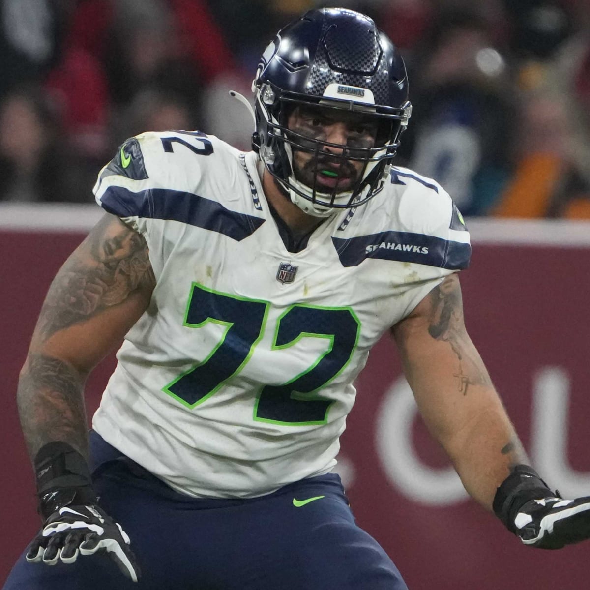 Seattle Seahawks offensive tackle Abraham Lucas (72) gets set