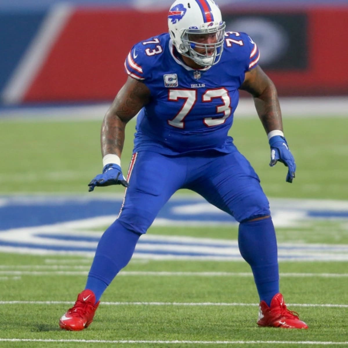 Buffalo Bills tackle Dion Dawkins (73) runs on the field during