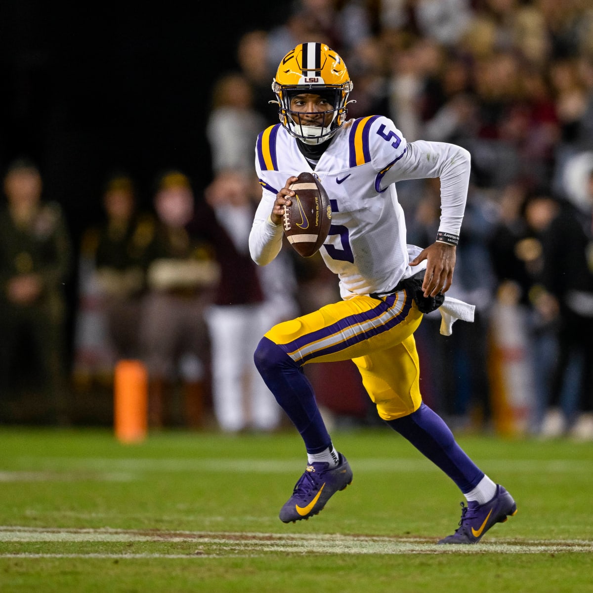 Baton Rouge, USA. 25th Mar, 2023. March 25, 2023: LSU quarterback Jayden  Daniels (5) makes a throw during Spring football practice at Tiger Stadium  in Baton Rouge, LA. Jonathan Mailhes/CSM/Sipa USA(Credit Image: ©