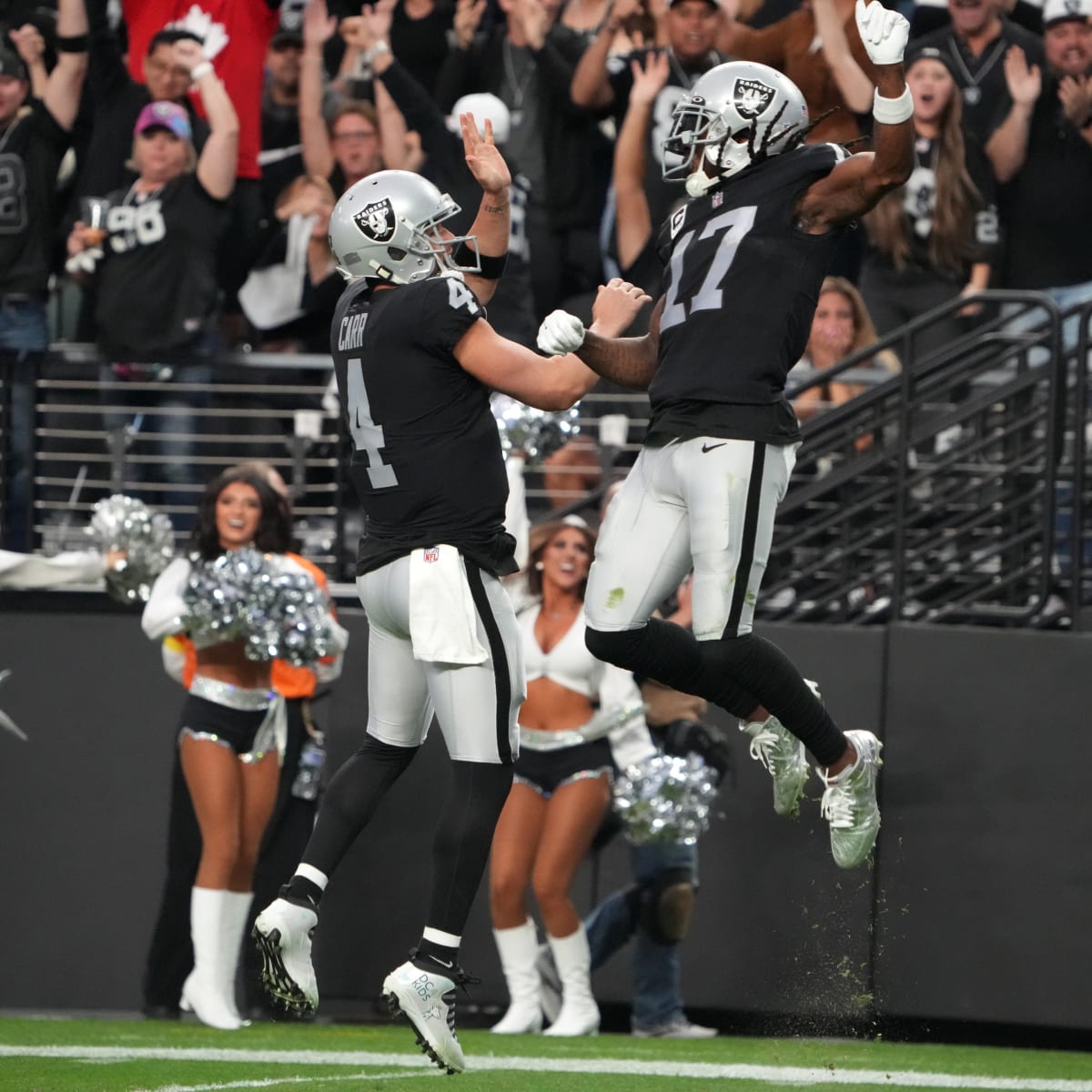 Las Vegas Raiders quarterback Derek Carr and wide receiver Davante