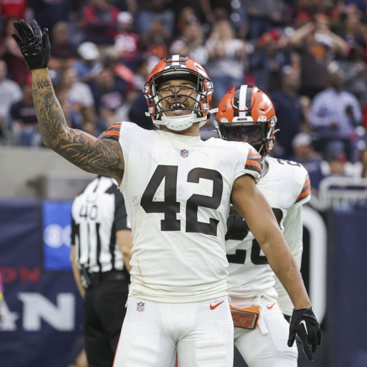 Cleveland Browns linebacker Tony Fields II (42) jogs off of the field  during an NFL preseason football game against the Philadelphia Eagles,  Sunday, Aug. 21, 2022, in Cleveland. (AP Photo/Kirk Irwin Stock