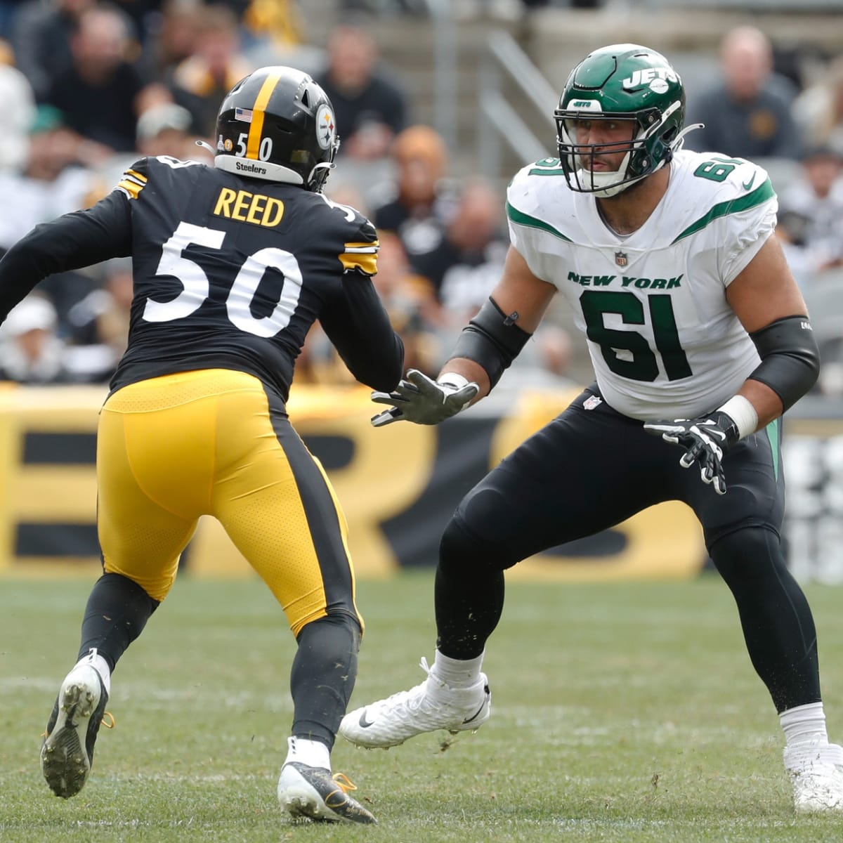 New York Jets offensive tackle Max Mitchell (61) blocks during an