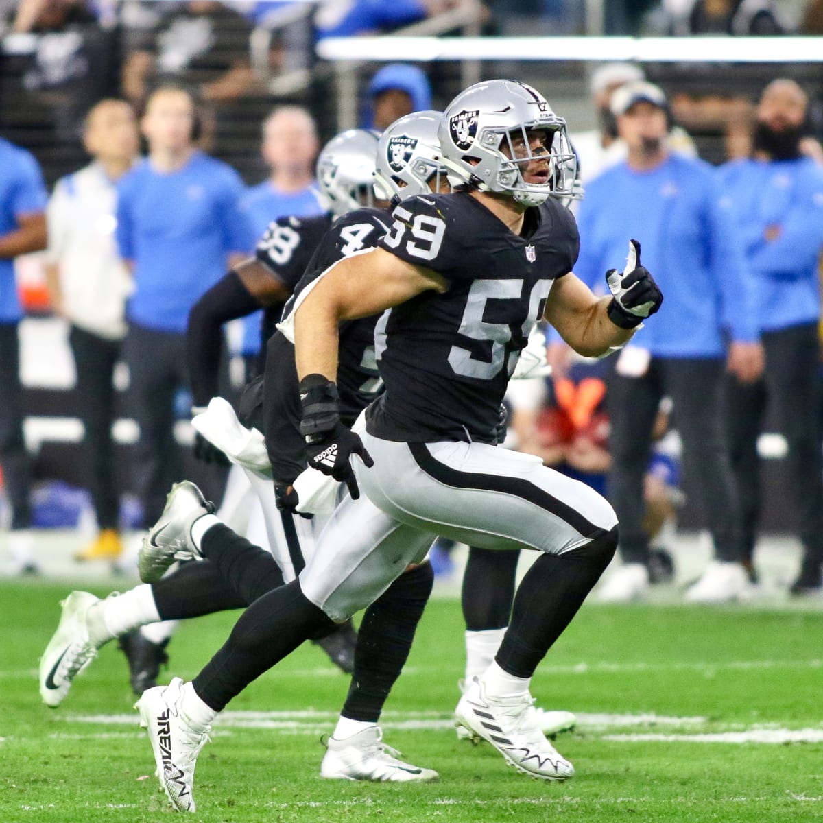 Arlington, United States. 26th Aug, 2023. Dallas Cowboys quarterback Will  Grier (15) is tackled by Las Vegas Raiders linebacker Luke Masterson (59)  during a NFL preseason season game between the Las Vegas