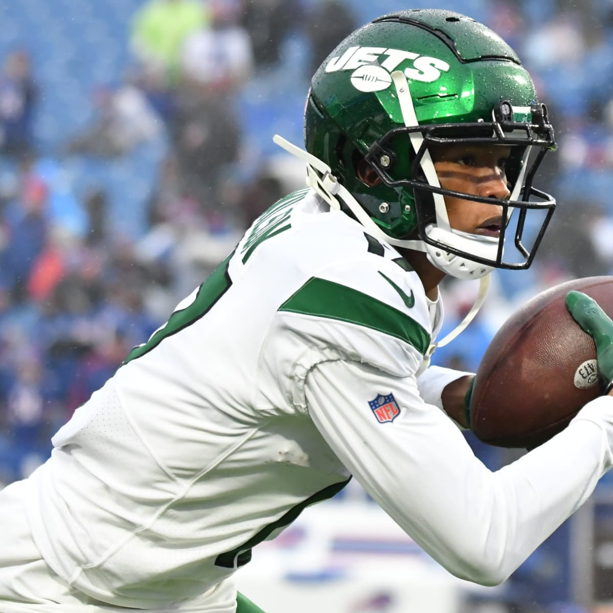 New York Jets wide receiver Garrett Wilson (17) warms up before taking on  the Miami Dolphins during an NFL football game Sunday, Oct. 9, 2022, in  East Rutherford, N.J. (AP Photo/Adam Hunger