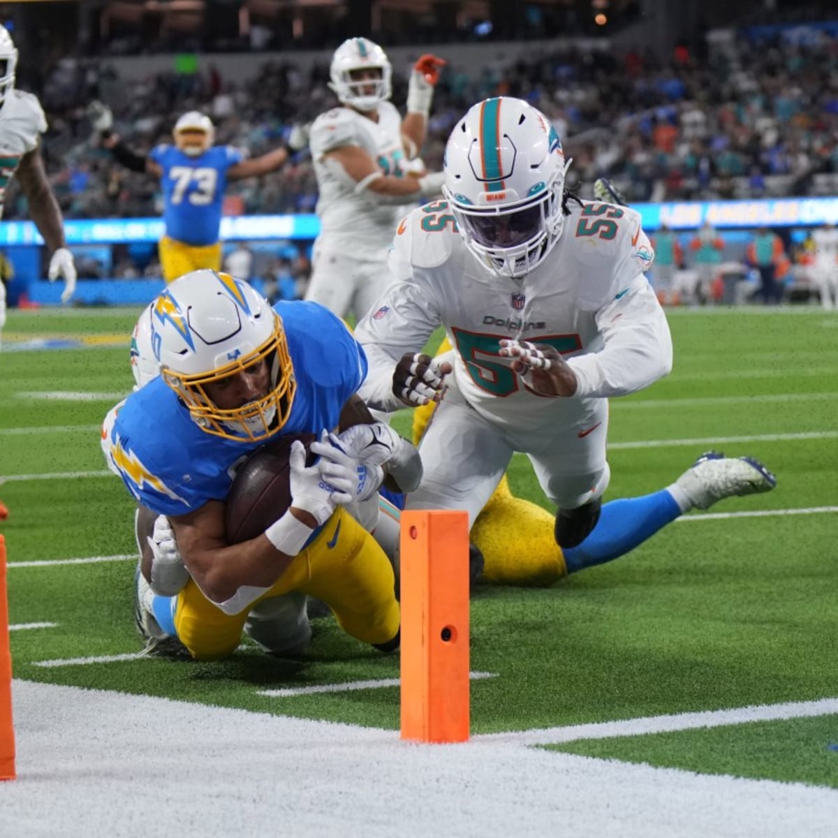 Miami Gardens, Florida, USA. 29th Sep, 2019. A group of Miami Dolphins  players get ready for a play during an NFL football game against Los  Angeles Chargers at the Hard Rock Stadium