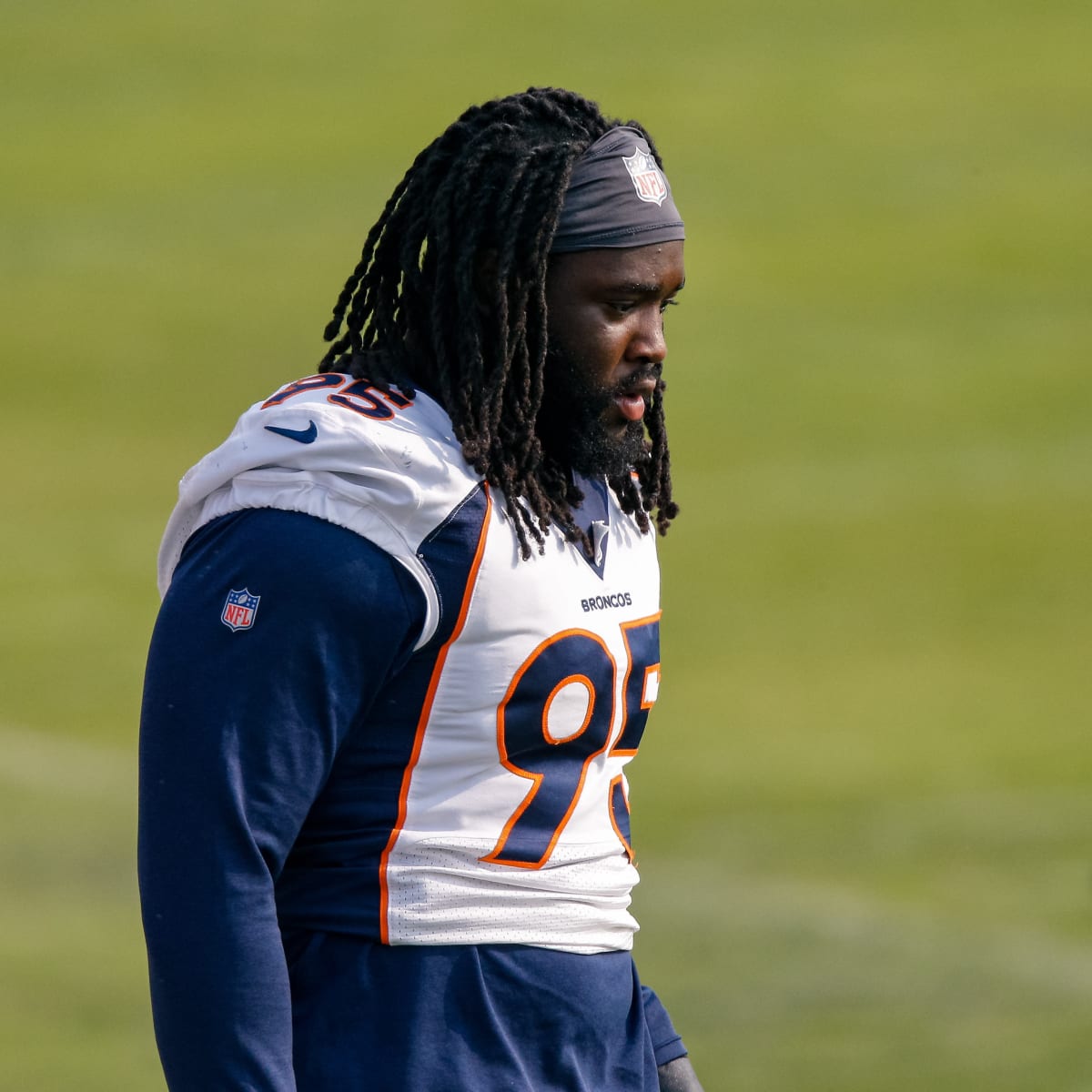 Denver Broncos defensive tackle McTelvin Agim (95) greets family