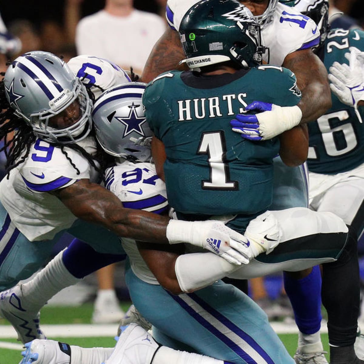 Arlington, United States. 27th Sep, 2021. Philadelphia Eagles quarterback  Jalen Hurts scrambles against the Dallas Cowboys during their NFL game at  AT&T Stadium in Arlington, Texas on Monday, September 27, 2021. Photo