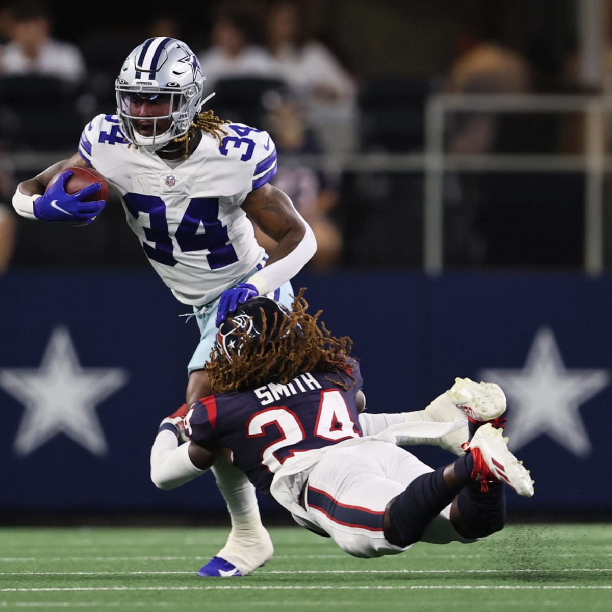 ARLINGTON, TX - DECEMBER 11: Dallas Cowboys RB Malik Davis runs during a  special teams play during the game featuring the Houston Texans and the  Dallas Cowboys on December 11, 2022 at